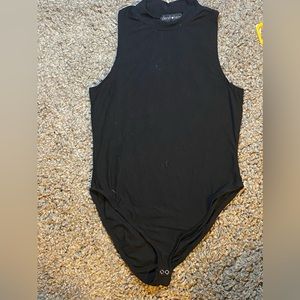 Black medium body suit